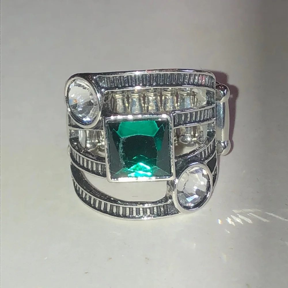 Silver Tone Ring with Green Center Stone and Clear Accents